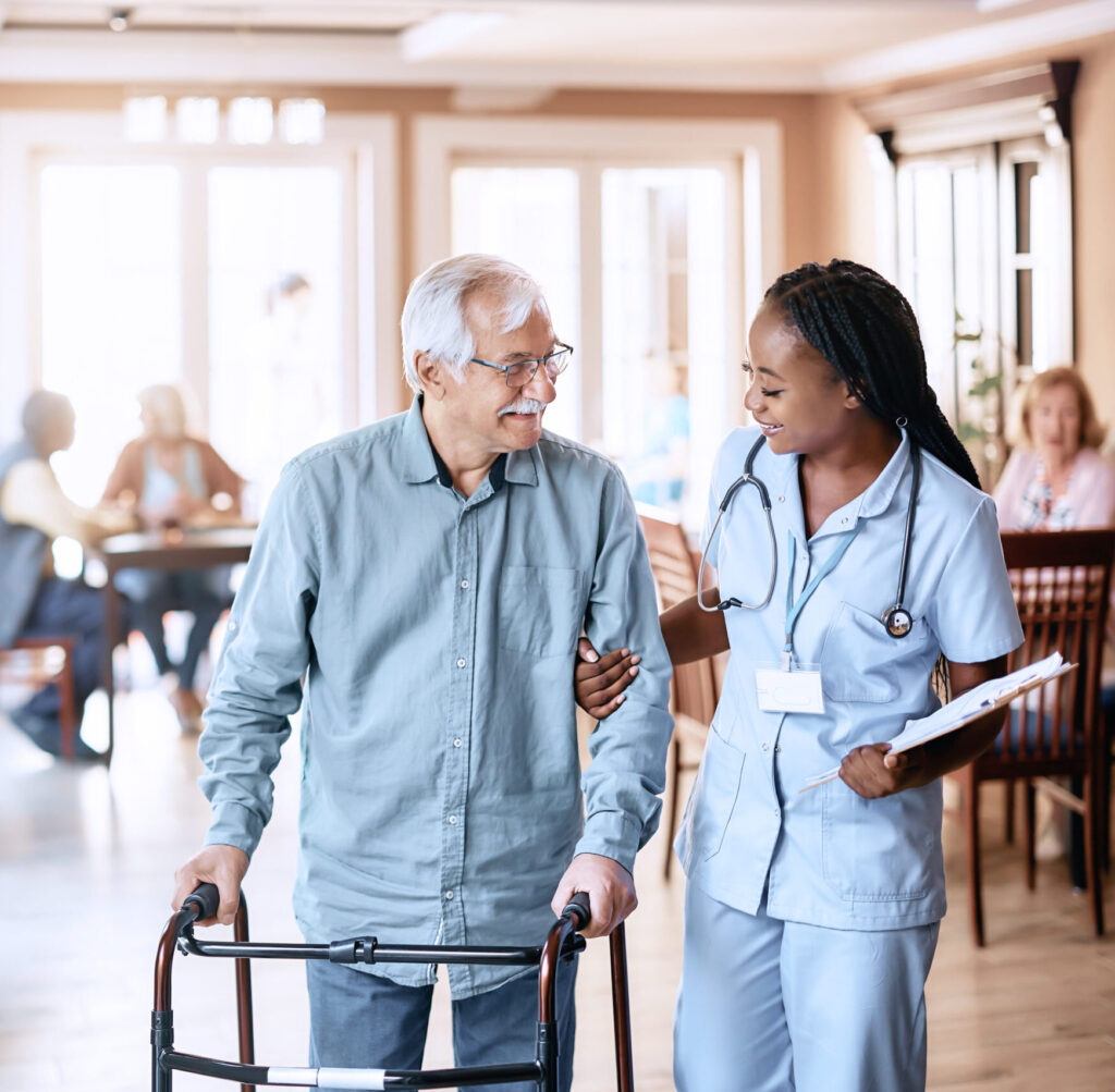 Licensed vocational nurse helping an elderly patient